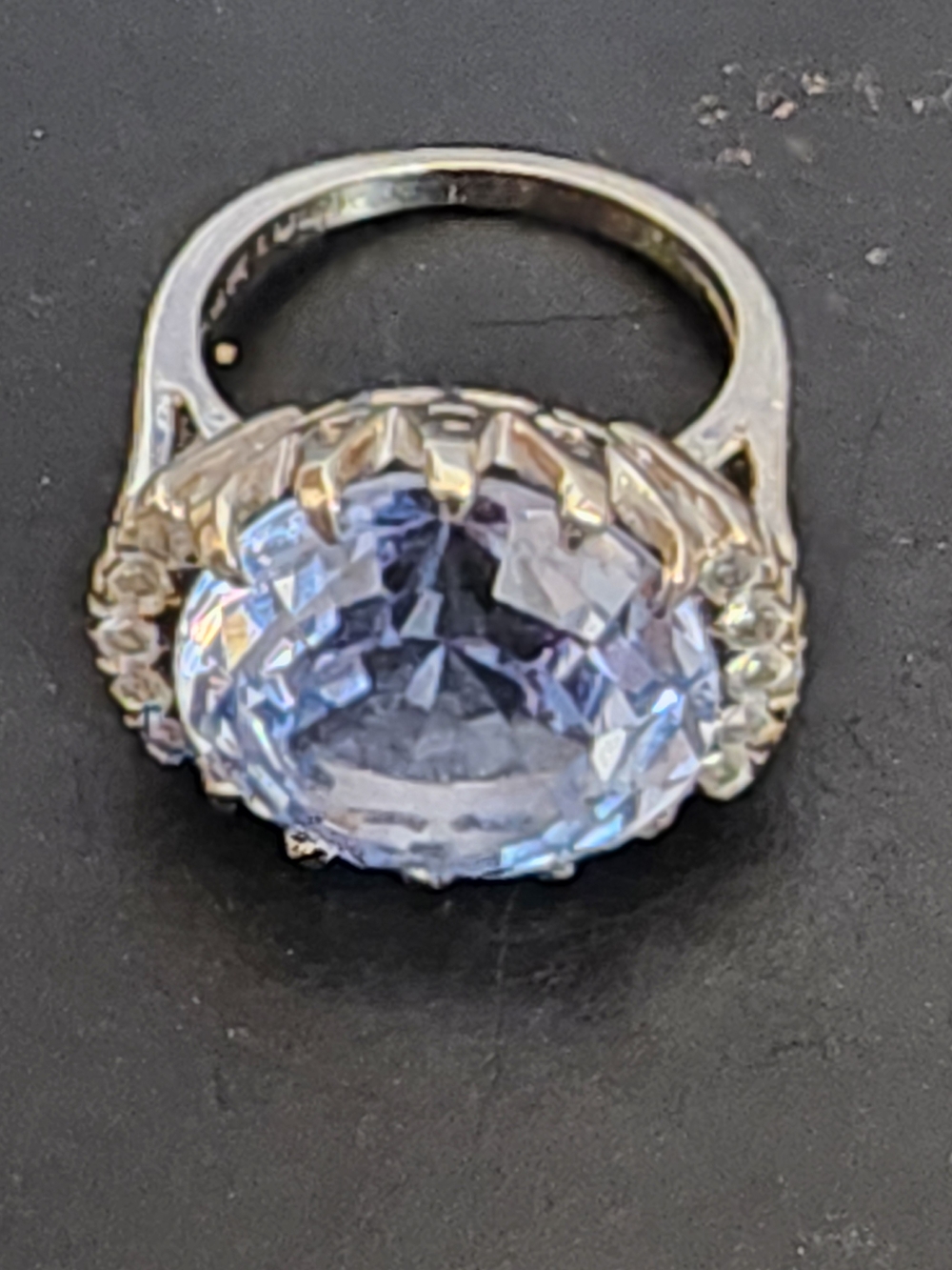 10k gold ring with big aquamarine gemstone and diamonds